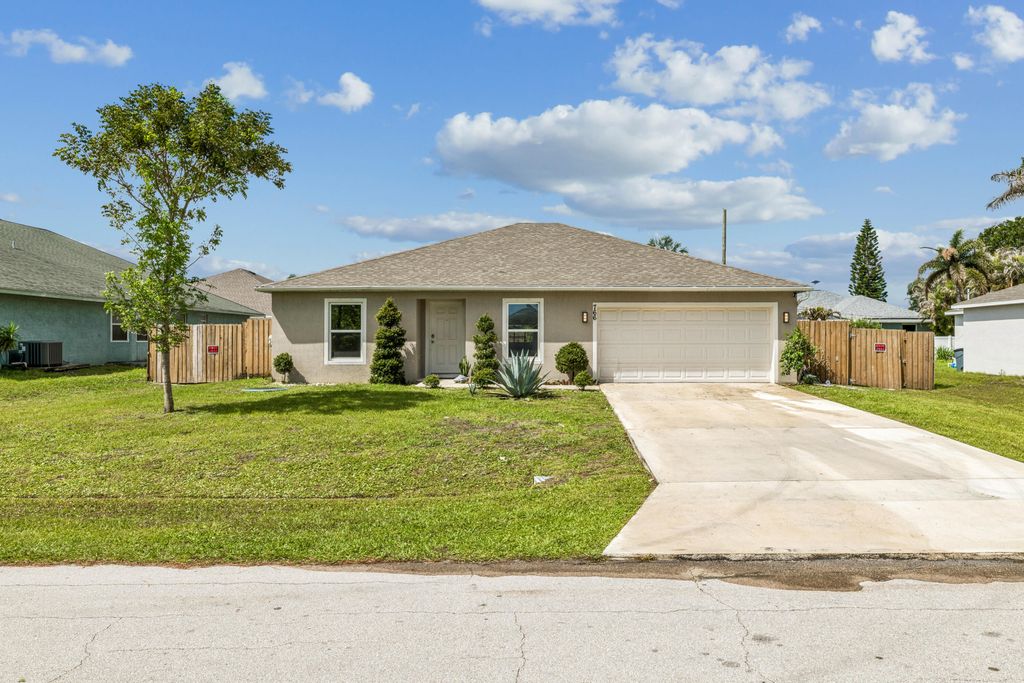 Photo of 766 SE Academy Lane, Port Saint Lucie, FL 34984 (MLS # B26032118)