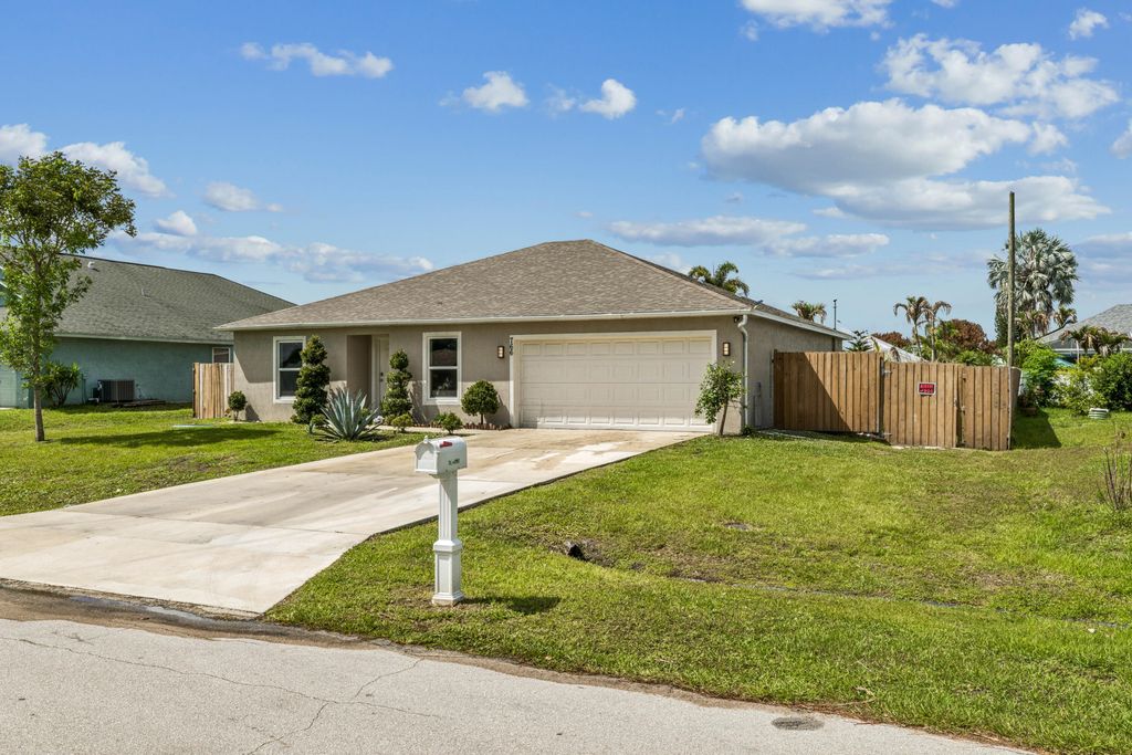 Photo of 766 SE Academy Lane, Port Saint Lucie, FL 34984 (MLS # B26032118)