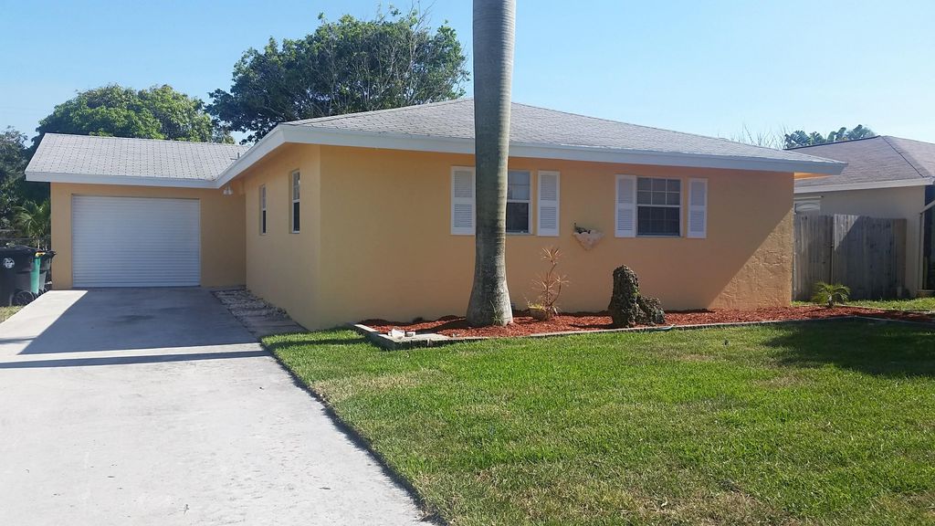 Photo of 1523 19th Avenue N, Lake Worth Beach, FL 33460 (MLS # R10962403)