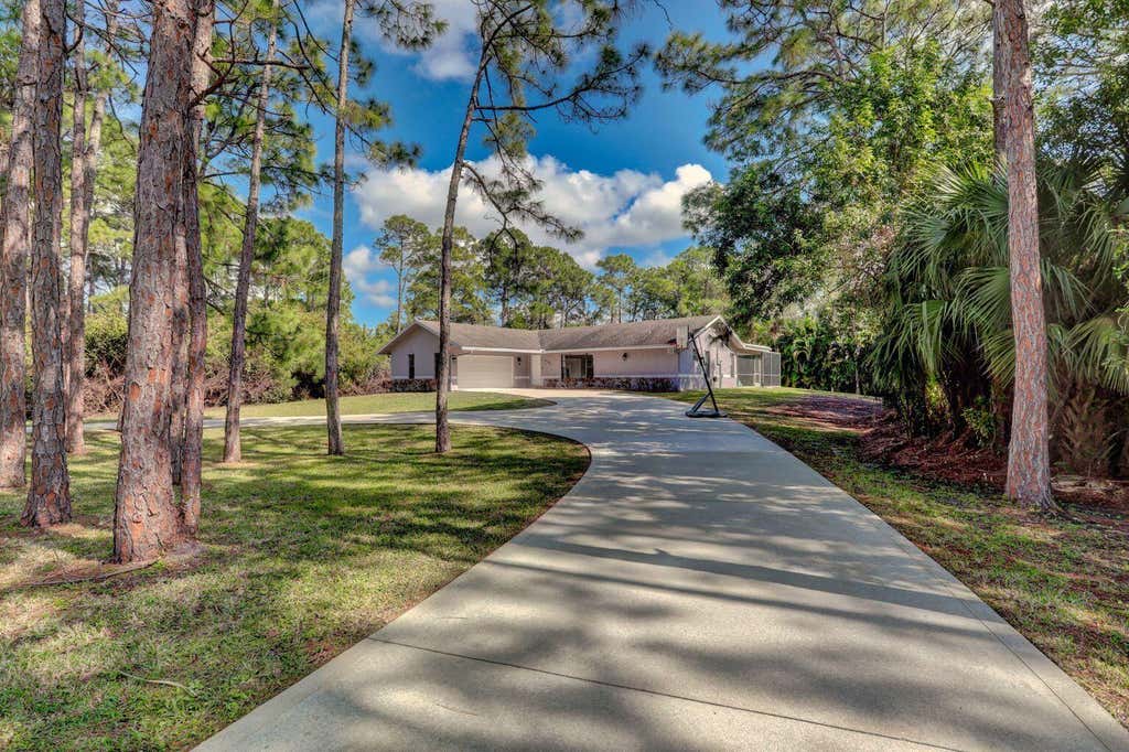 Photo of 15864 N 76th Trail N, Palm Beach Gardens, FL 33418 (MLS # R10783363)