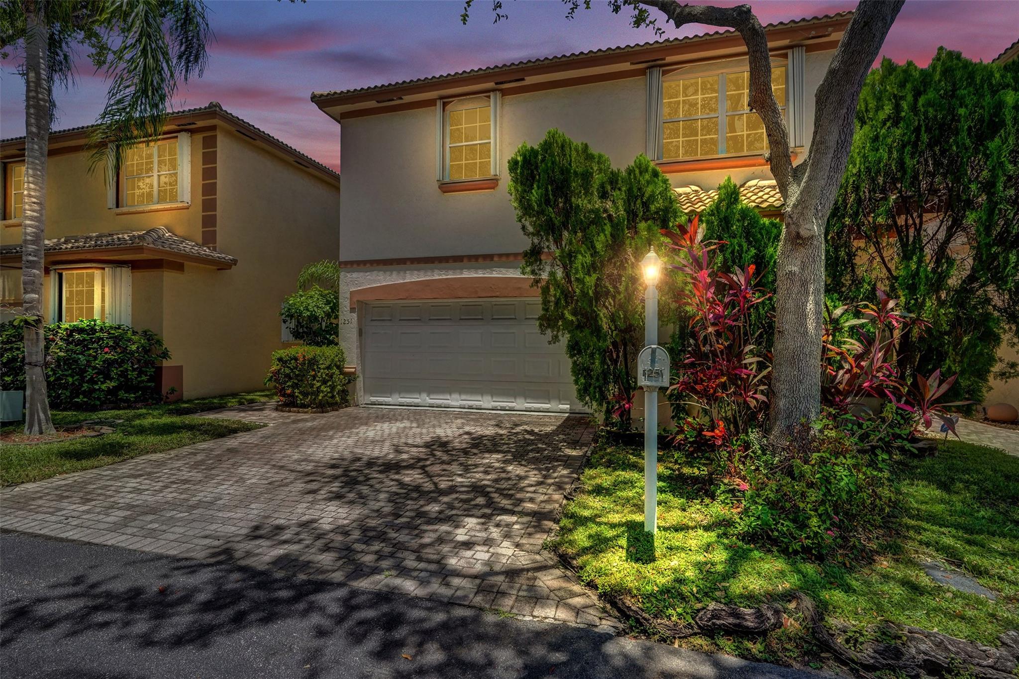This bright and modern 2-story house just turned 25 years old and looking for a new owner. Located only a 7-minute drive from the beach and walking distance to the stroll around Hollywood lakes and Holland park with its boat ramps, biking and kayaking. You won't have to worry about the yard maintenance as it is included with HOA as well as the swimming pool.