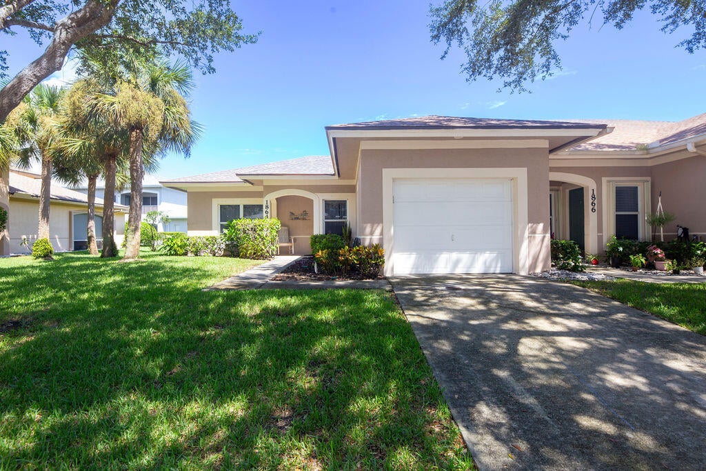 Photo of 1864 S Dovetail Drive #A1, Fort Pierce, FL 34982 (MLS # B26074876)