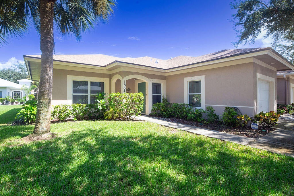 Photo of 1864 S Dovetail Drive #A1, Fort Pierce, FL 34982 (MLS # B26074876)