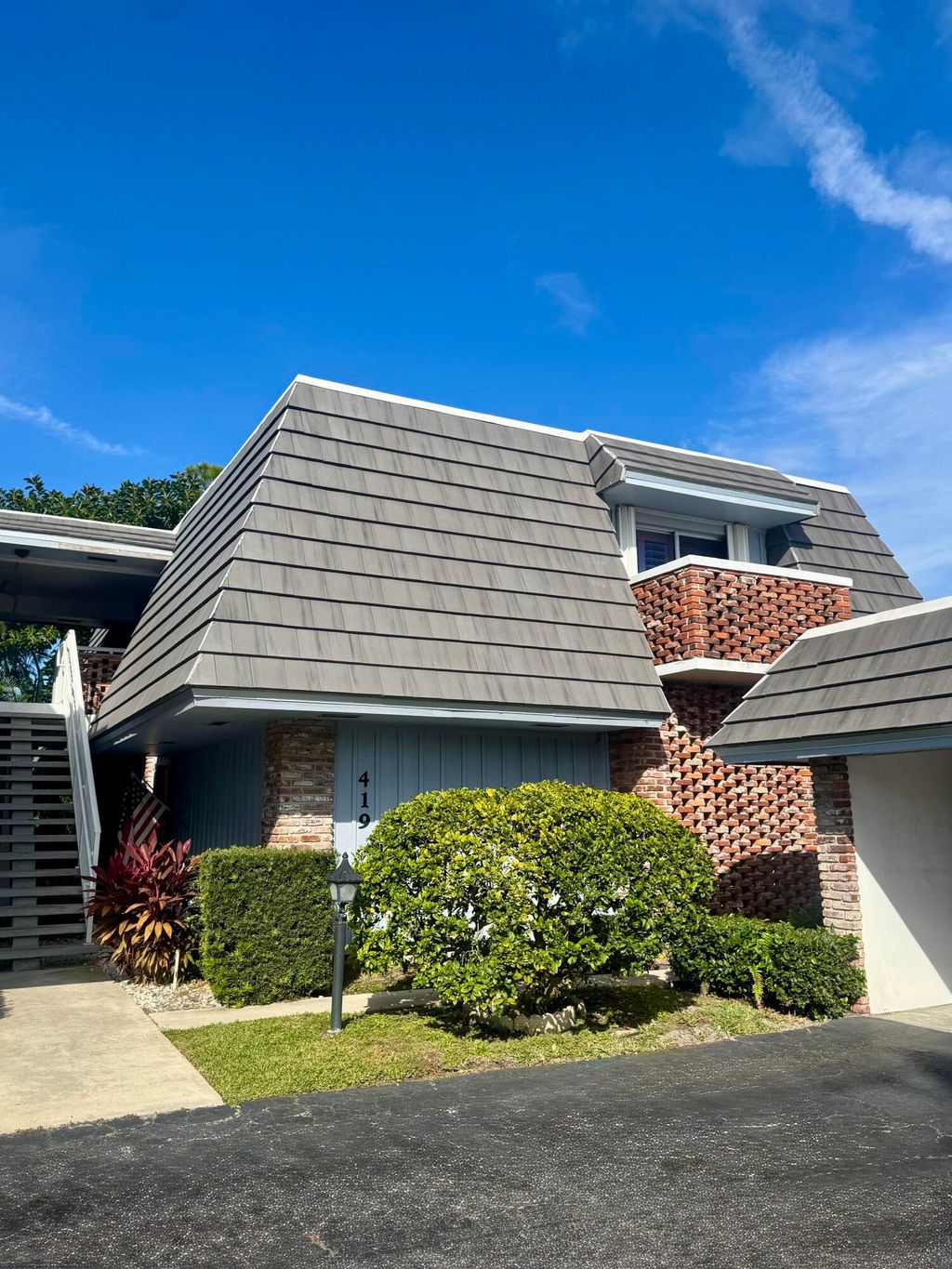 Photo of 419 Pine Tree Court #19, Atlantis, FL 33462 (MLS # B26008479)