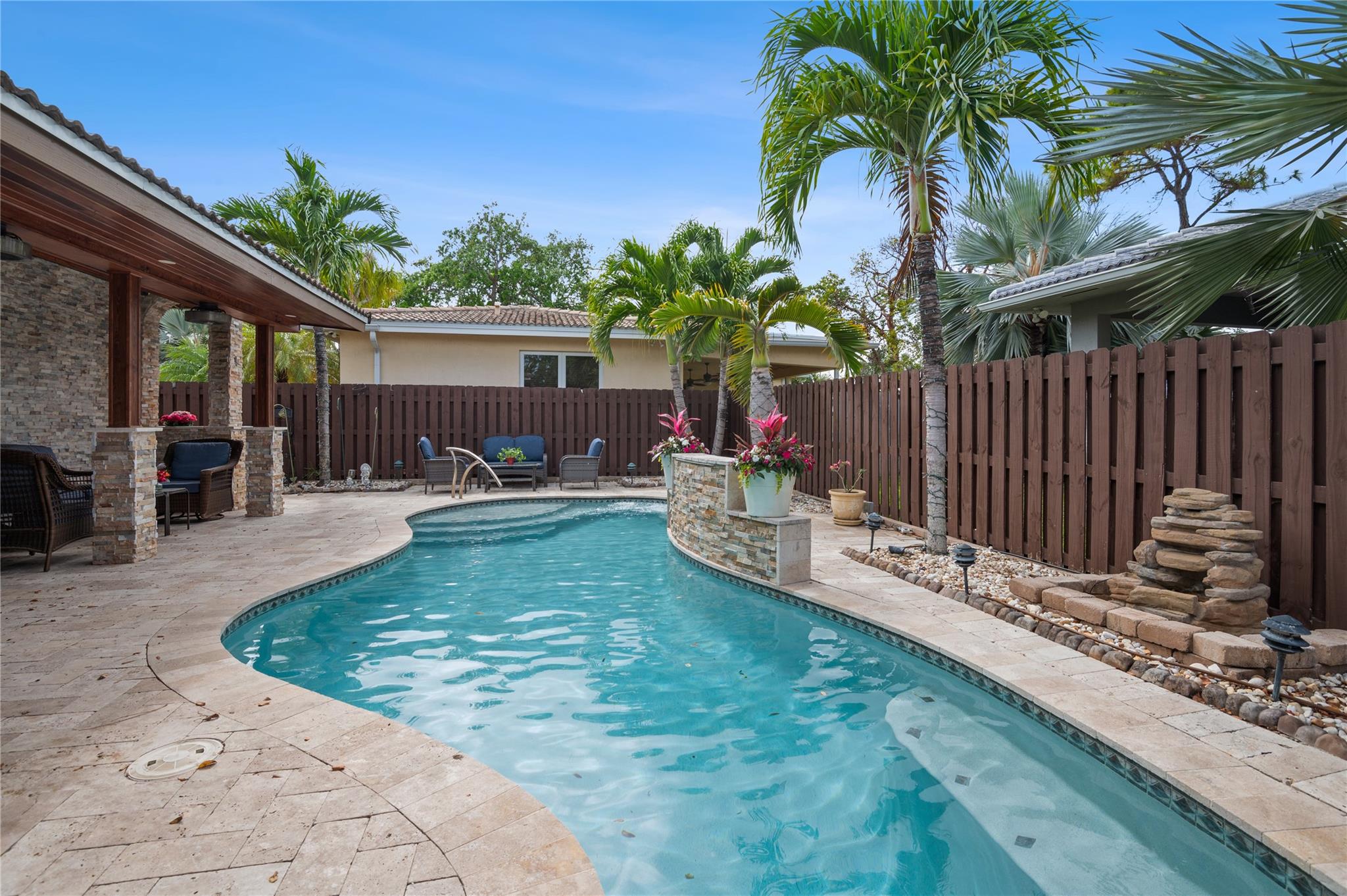 SELLER MOTIVATED!!! STUNNING, UNIQUELY DESIGNED HOME ON A CORNER LOT IN MUCH SOUGHT AFTER SOUTHEAST DANIA BEACH!!! IMMACULATE HOME WITH 4 BEDROOMS/3 BATHROOMS!!!HUGE MASTER SUITE WITH WAlK-IN CLOSET AND PRIVATE SPA LIKE BATH ALL BEDROOMS ARE GENEROUSLY SIZED! OVERSIZED KITCHEN WITH HUGE DINING/LIVING ROOM COMBO WITH 10FT CEILINGS PLUS SEPARATE FAMILY ROOM! A BONUS SUNROOM THAT OVERLOOKS A BREATHTAKING TROPICAL PARADISE WITH COVERED OAK PATIO AND POOL WITH JACUZZI SPA JETS! MINUTES FROM THE BEACH AND DANIA POINTE! THIS HOME HAS 2 DRIVEWAYS AND A 2 CAR GARAGE! SECURITY CAMERAS THROUGHOUT, SMART POOL SYSTEM, SPRINKLERS AND MUCH MUCH MORE! TOO MANY EXTRAS TO LIST! BRING YOUR FUSSIEST BUYERS TO THIS BEAUTIFULLY MAINTAINED PROPERTY! ROOM FOR BOAT AND CLOSE TO MARINA