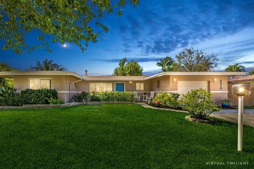 Amazing opportunity to live on the water in Lighthouse Point in this 3 bedroom/3 bathroom home with only one fixed bridge to get to the inlet!  Situated on 85' of ocean access waterfront on the Egret Waterway, this home boasts a 70' dock installed in 2016, all the cast iron pipes replaced in 2018, full impact windows and doors, salt system for the pool AND separate hot tub included! Double gate fence door to the side yard allows for boat, trailer or jet ski parking & a oversized 1 car garage.  Interior features beautiful natural light, open living space, updated kitchen with stainless steel appliances, real wood burning fireplace and 3 good sized bedrooms.  Enjoy the ocean breezes and gorgeous sunrise/sunsets from this well cared for home that is just minutes to the intracoastal waterway!