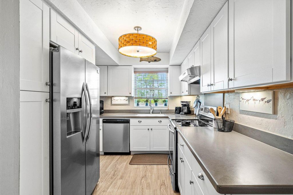 Photo of 18081 SE Country Club Drive #32-313, Jupiter, FL 33469 (MLS # R11150879)