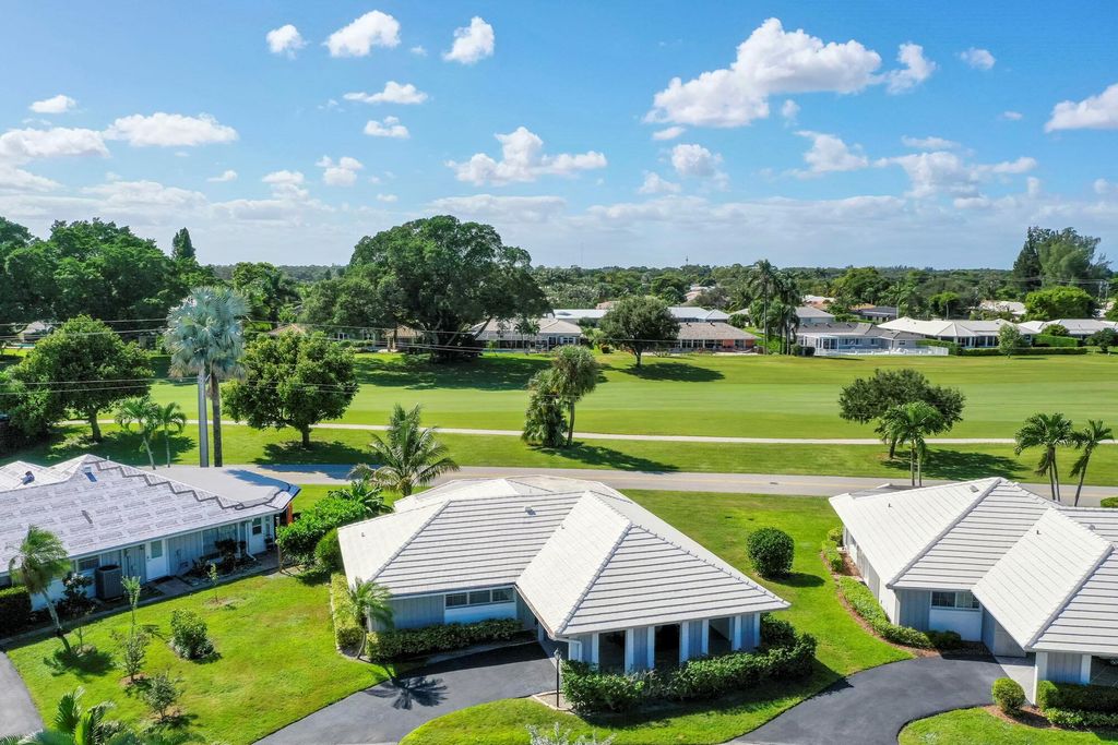 Photo of 127 Driftwood Circle, Atlantis, FL 33462 (MLS # R10933704)