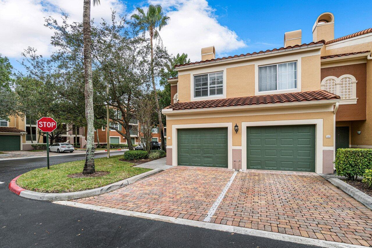 Light and bright recently renovated end-unit St. Andrews Townhouse! Two Primary Suites, dedicated parking space, one car garage with entry to the home. Clean and tidy with crown molding and master bedroom balcony. Gated community with manager on site. Amenities include heated swimming pool, large entertainment room, indoor racquetball, tennis court and fully equipped gym overlooking pool and golf course.
