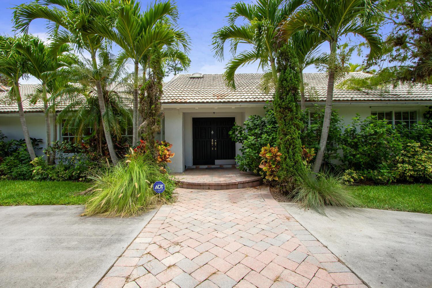 Looking for the perfect rental for the equestrian season in Wellington ? This spacious 4 bed, 2.5bath, 2 car garage home offers 3,058 sq ft of living space on one full acre. The property boasts alarge, covered patio with outdoor kitchen and seating area for enjoying the South Florida weather. Relaxin a private, heated pool or play a match on your own private tennis court! The kitchen is equipped withstainless steel appliances, a double oven, granite countertops, large center island and ample storage.The lot features lush, established landscaping giving added privacy.A 2 car garage and circular drivewayallow for ample parking. This home is located in the Pinewood East neighborhood just minutesfrom WEF, top-rated schools, shopping centers and fine dining .Pets are welcomed too