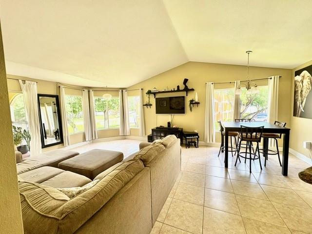Welcome to your new home! Here you’ll enjoy a spacious 2-bed, 2-bath CORNER unit featuring two primary suites, vaulted ceilings, and an open-concept layout filled with an undeniable bright and airy energy as the natural light fills the room. Granite countertops in kitchen and bathrooms and plenty of storage throughout. The private screened-in balcony with stunning lake views will have you feeling like you’re always on vacation! Sailboat Pointe is a gated, pet-friendly, all-ages community with amenities to keep you healthy and happy including pools, hot tub, clubhouse, fitness center, library, and tennis courts. There is one assigned space and plenty of guest parking. Conveniently located near I-95, shopping, dining, and just minutes from Mills Pond Park.