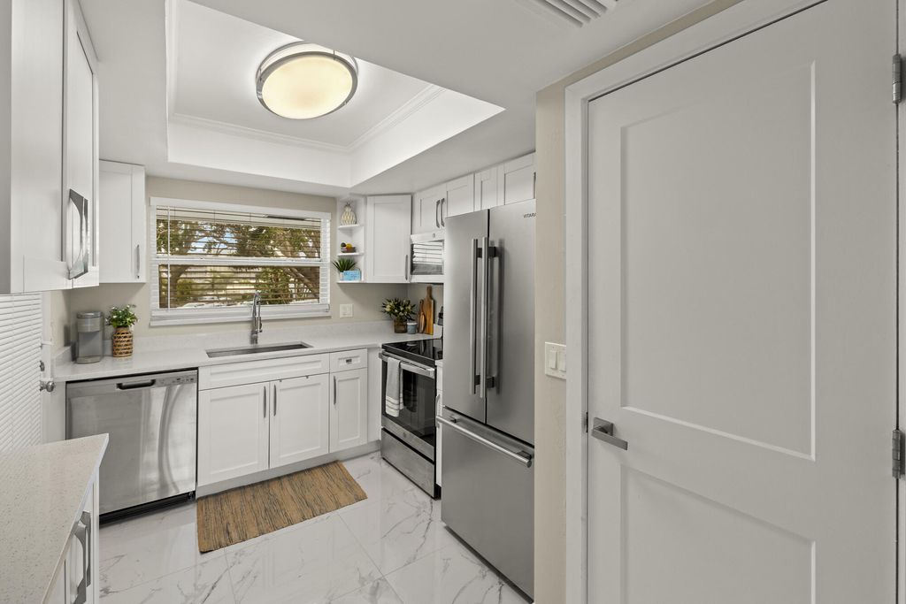 Photo of 68 Yacht Club 23 Drive #23, North Palm Beach, FL 33408 (MLS # R11071023)