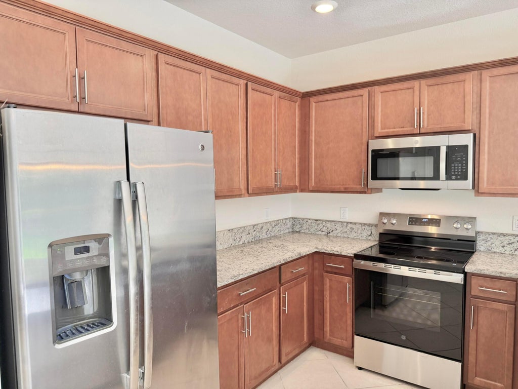 Photo of 6172 BANGALOW Drive, Lake Worth, FL 33463 (MLS # B26093803)