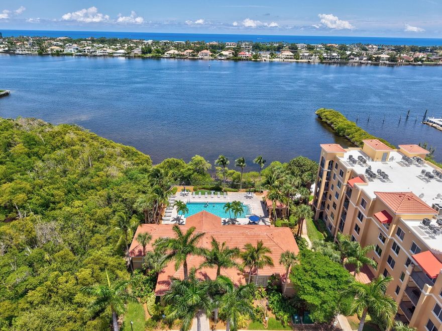 New roof 2023! Beautifully remodeled 3BR/2BA townhome w 1-car garage in a waterfront Intracoastal community. Features a modern remodeled kitchen with granite counters, stainless steel appliances, extended bar seating & pantry. Open-concept, split-bedroom layout w spacious living areas. Large primary suite offers walk-in closet, dual-sink quartz vanity, and walk-in shower. Two generous guest rooms and updated second bath w walk-in shower. Full-size washer/dryer inside. Relax on the oversized balcony w peaceful tree views. Resort-style amenities: Intracoastal pool, private beach, gym, sauna, clubhouse with billiards, kayak storage small fee, and marina next door offers boat club. Prime location near downtown & I-95. Amenities, exterior insurance, water & reserves included. Pets & Lease Ok.