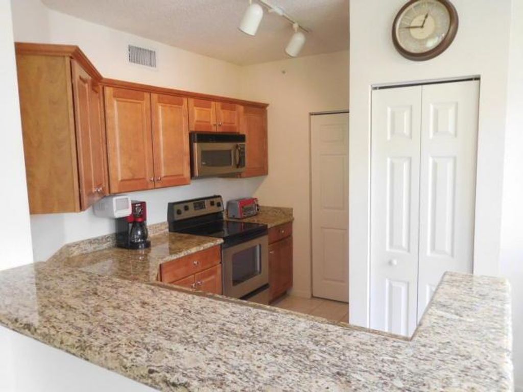 Photo of 11780 St Andrews Place #201, Wellington, FL 33414 (MLS # R11126828)