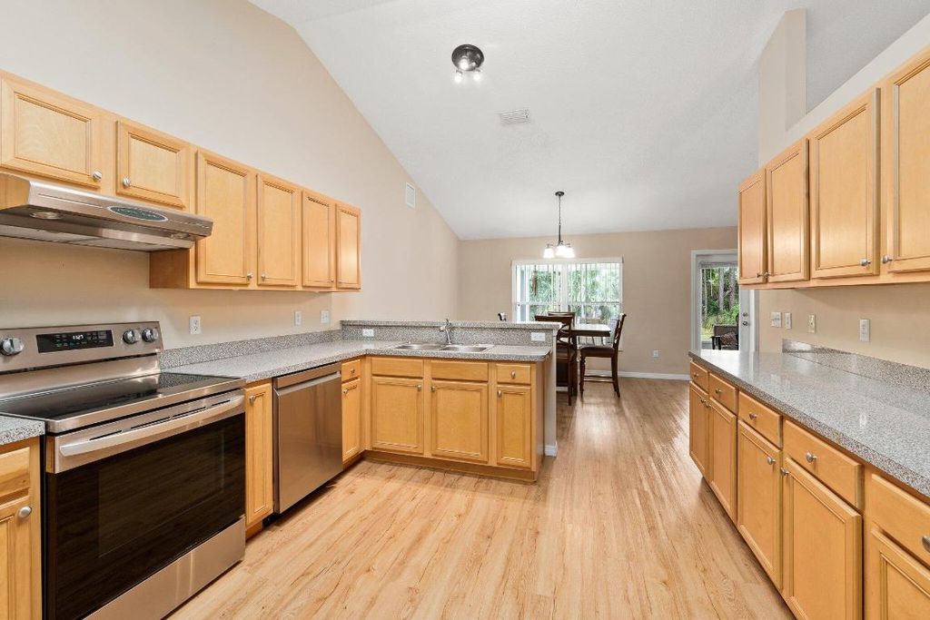 Photo of 1500 SW Hunnicut Avenue, Port Saint Lucie, FL 34953 (MLS # R10941257)