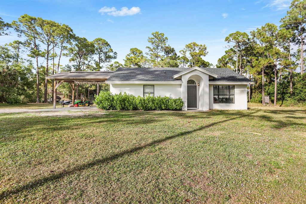 Photo of 17563 67th Court N, The Acreage, FL 33470 (MLS # R11148759)
