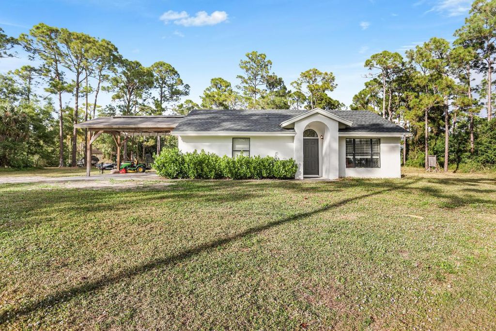 Photo of 17563 67th Court N, The Acreage, FL 33470 (MLS # R11148759)