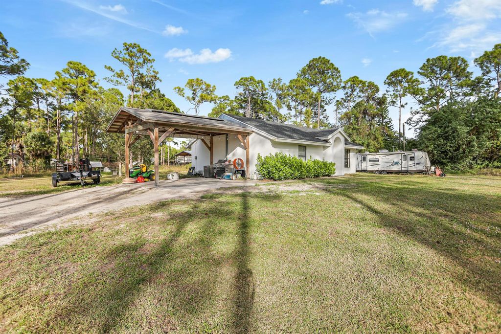 Photo of 17563 67th Court N, The Acreage, FL 33470 (MLS # R11148759)