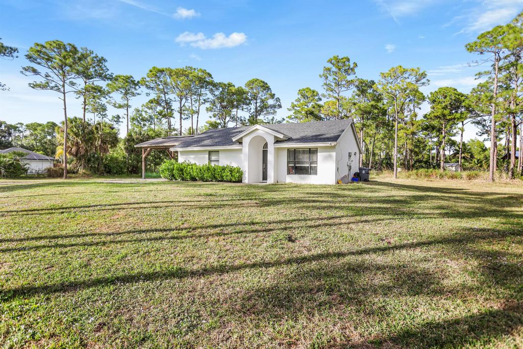 Photo of 17563 67th Court N, The Acreage, FL 33470 (MLS # R11148759)