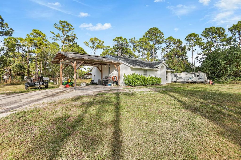 Photo of 17563 67th Court N, The Acreage, FL 33470 (MLS # R11148759)