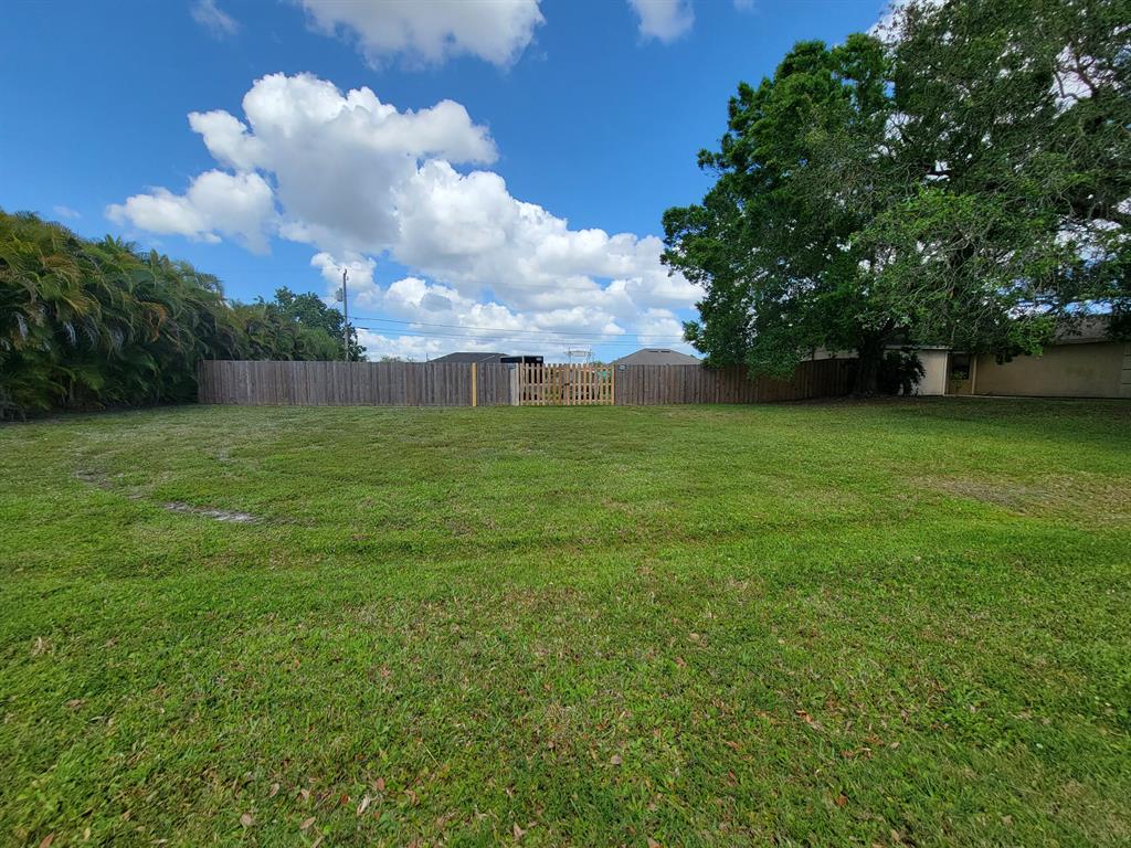 CLEARED, FILLED & LANDSCAPED LOT in southern Port Saint Lucie. This lot is ready for Your Dream Home! Please do NOT walk beyond the fence line.