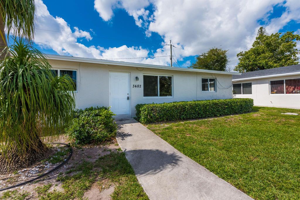 Photo of 3482 48th Lane S, Lake Worth, FL 33461 (MLS # R10982859)