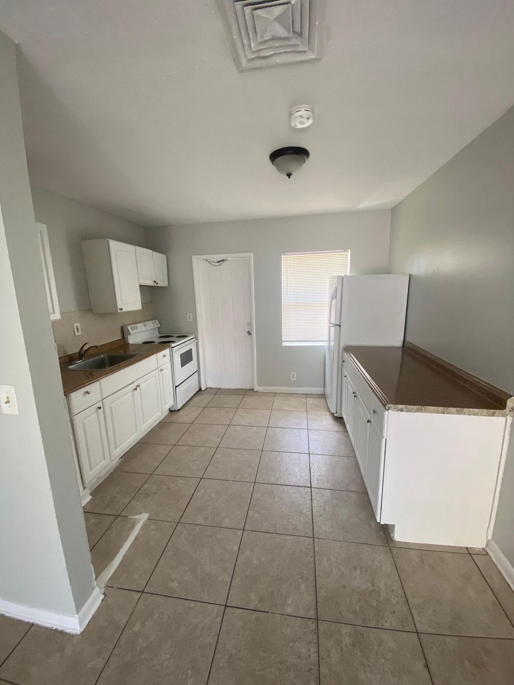 Photo of 3716 Henry Avenue, West Palm Beach, FL 33405 (MLS # B26040302)