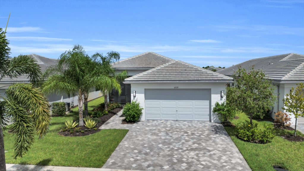 Photo of 12579 SW Pink Playa Parkway, Port Saint Lucie, FL 34987 (MLS # B26068150)