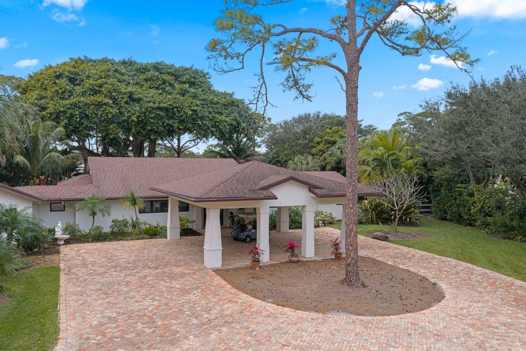 Photo of 4579 Square Lake Drive, Palm Beach Gardens, FL 33418 (MLS # R11161559)