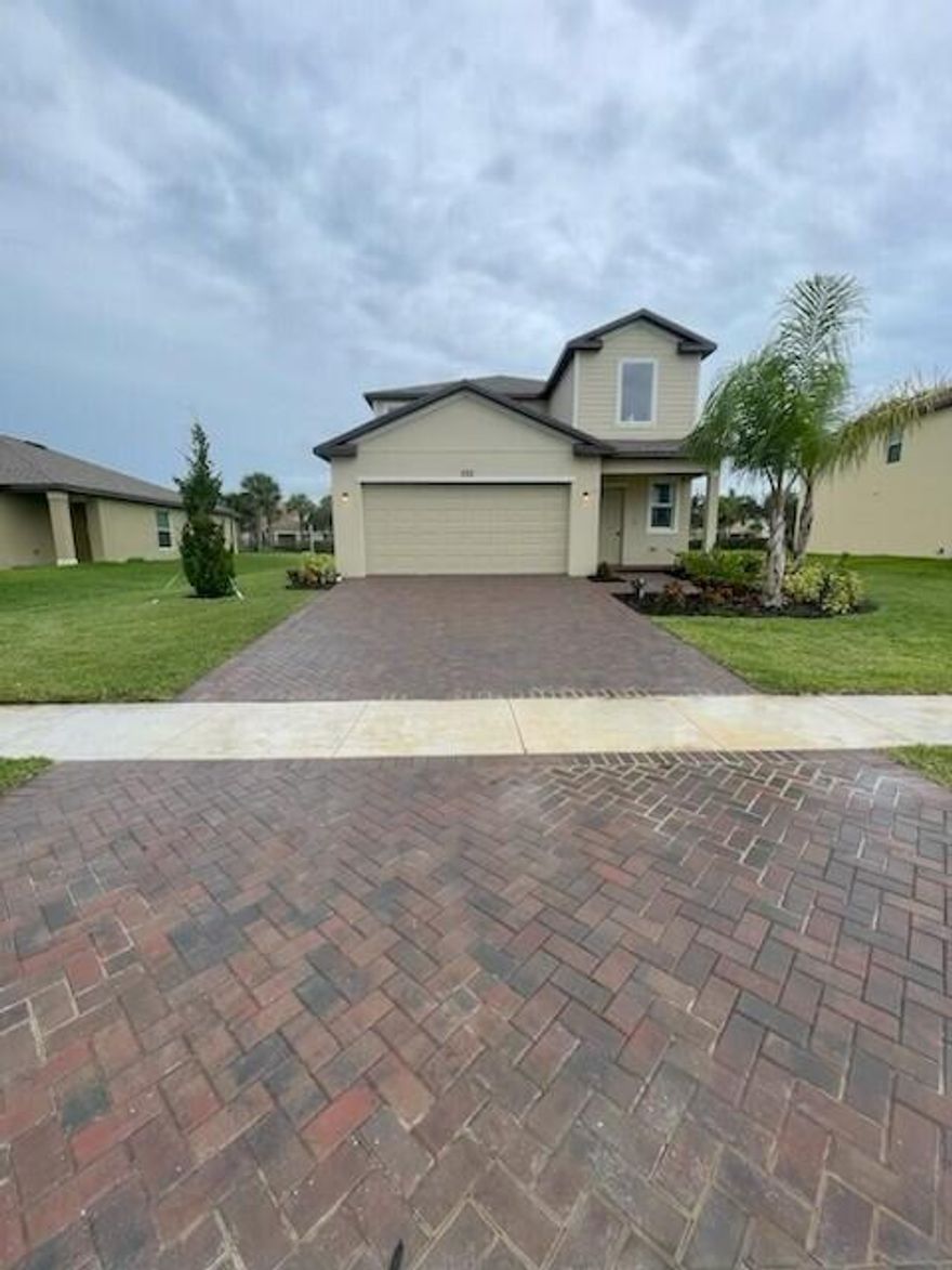 Two-story home with an open layout, seamlessly integrating a first-floor kitchen with a central island, a dining room and a welcoming family room with patio access. On the same level is a private owner's suite with an attached bathroom. Situated upstairs is a versatile loft for additional shared living space and four secondary bedrooms to provide restful retreats to family members and guests alike. Prices, dimensions and features may vary and are subject to change.