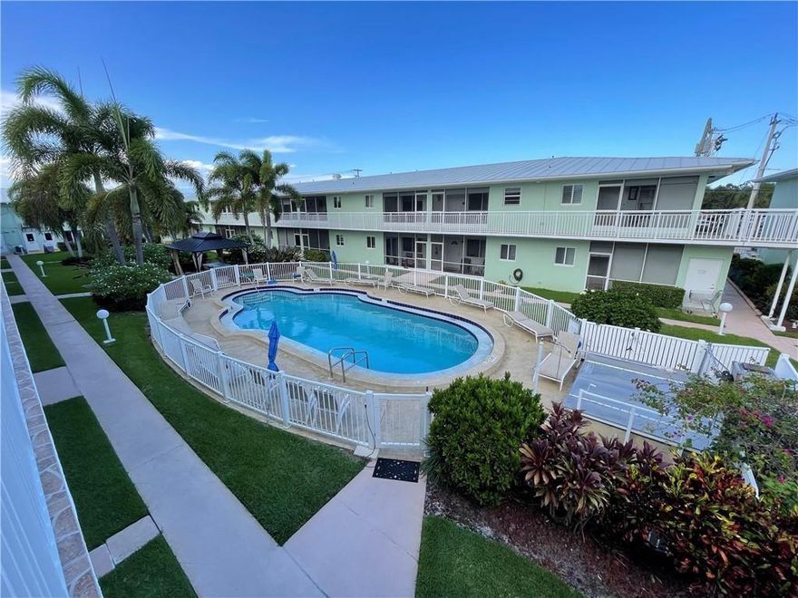 Live east of US1. Rarely available. Immaculate 2 bedroom 2 full bath first floor apartment overlooking the garden. Fully removed, Washer and Dryer in the unit, impact windows. Community is across the street from Publix and stores, community bus available in the area. Amenities include heated pool, BBQ area, tiki bar, party room, Shuffleboard, laundry room.