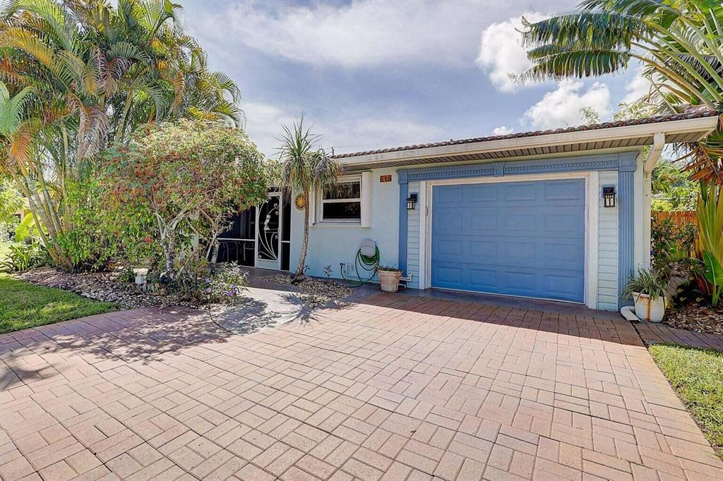 Gorgeous 3 Bedroom, 3 Bath fully furnished home in Tropic Palms, East Delray only 1.2 miles to the beach! Home is light, bright, & updated w/ a modern neutral pallette. Open concept w/ a spacious Living Room flowing through to the Dining Area with views to rear garden. Ceramic wood look tile, new recessed lighting, custom designed office area off of kitchen. Room for breakfast table. Newly renovated kitchen w/ white cabinets & gray quartz countertops, breakfast bar. Natural gas oven & cooktop, water filtration system at the sink, plus full house water filtration. Master Bedroom w/ updated Bathroom, walk in closet & impact sliders to the patio. Hurricane impact windows, sliders and doors, solar panels and a full house generator make this a solid, storm proof, low energy bill home