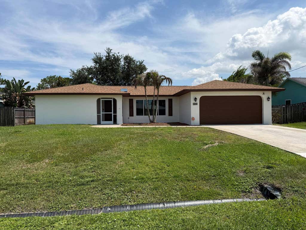 Photo of 450 SW Eyerly Avenue, Port Saint Lucie, FL 34983 (MLS # B26043965)