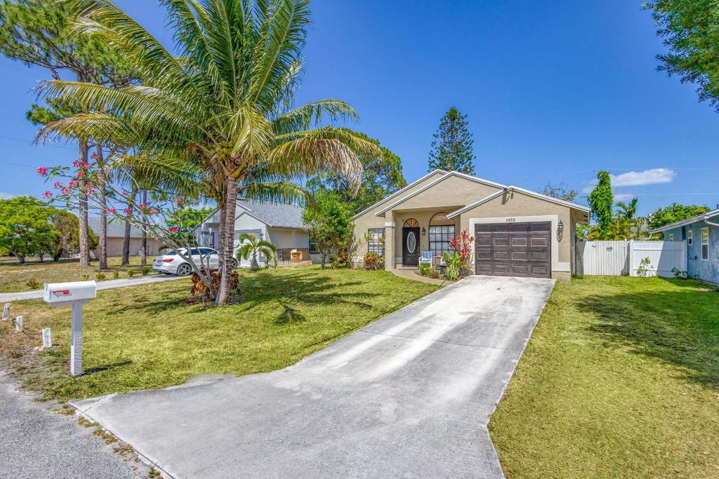 Photo of 5855 SE Mitzi Lane, Stuart, FL 34997 (MLS # R11086975)