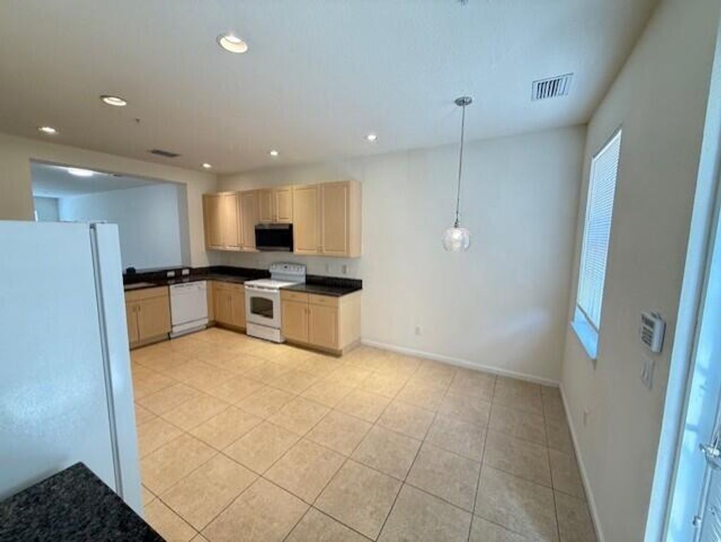 Photo of 221 Greenwich Circle #208, Jupiter, FL 33458 (MLS # R11146488)