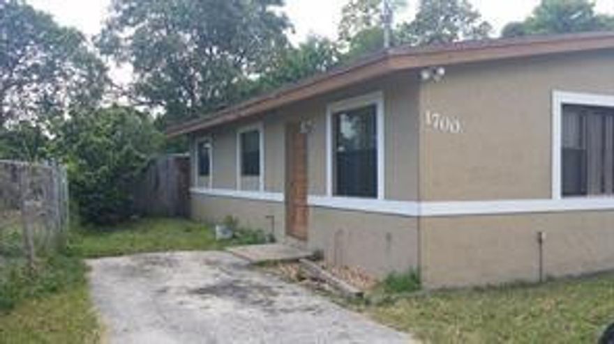 Updated home in Lauderdale Manor.  Washer and Dryer inside.  Large fenced backyard.