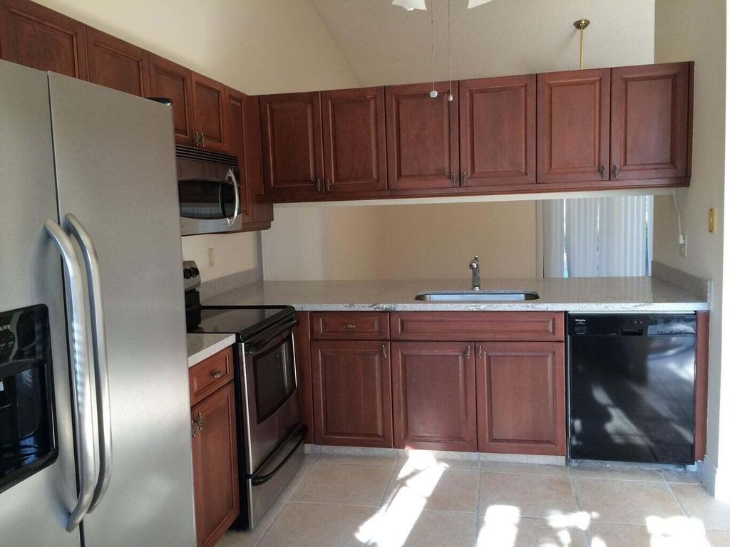 Photo of 4 Hawthorne Lane, Boynton Beach, FL 33426 (MLS # R10972286)