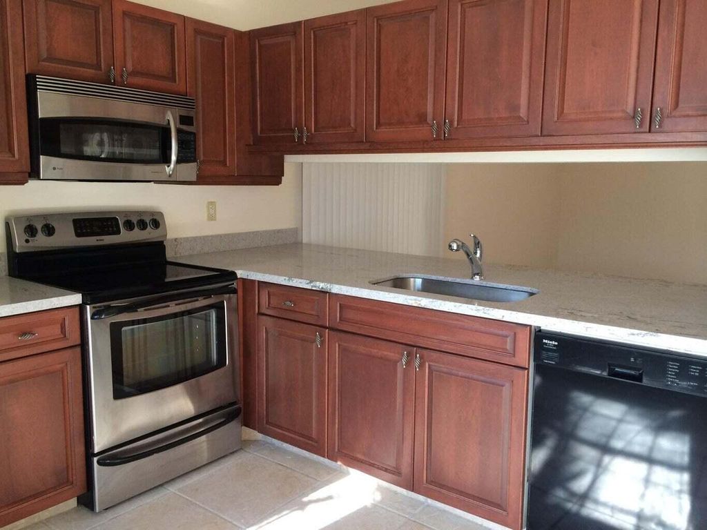 Photo of 4 Hawthorne Lane, Boynton Beach, FL 33426 (MLS # R10972286)