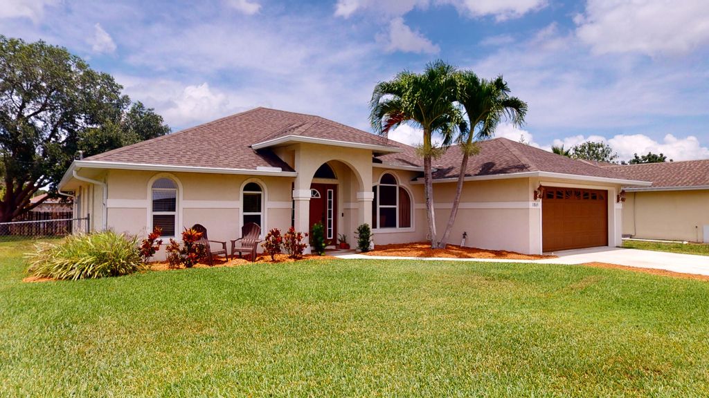 Photo of 1865 SW Effland Avenue, Port Saint Lucie, FL 34953 (MLS # R10801281)