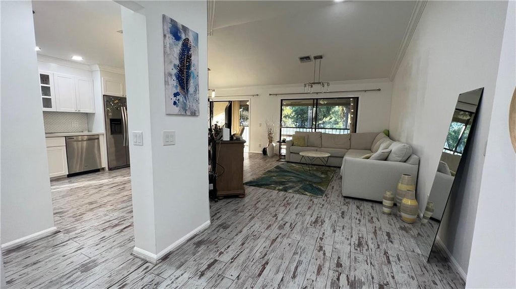 Photo of 5580 Coach House Circle #F, Boca Raton, FL 33486 (MLS # B26031635)