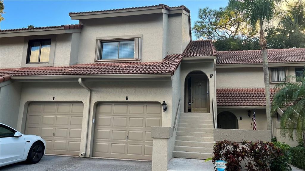 Photo of 5580 Coach House Circle #F, Boca Raton, FL 33486 (MLS # B26031635)