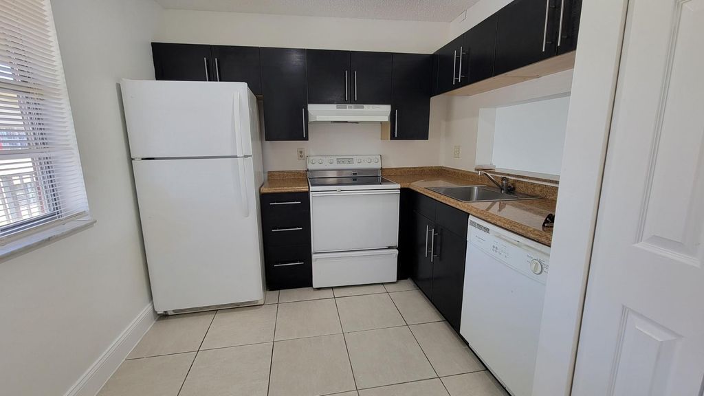 Photo of 3798 N University Drive #3798, Coral Springs, FL 33065 (MLS # F10505460)