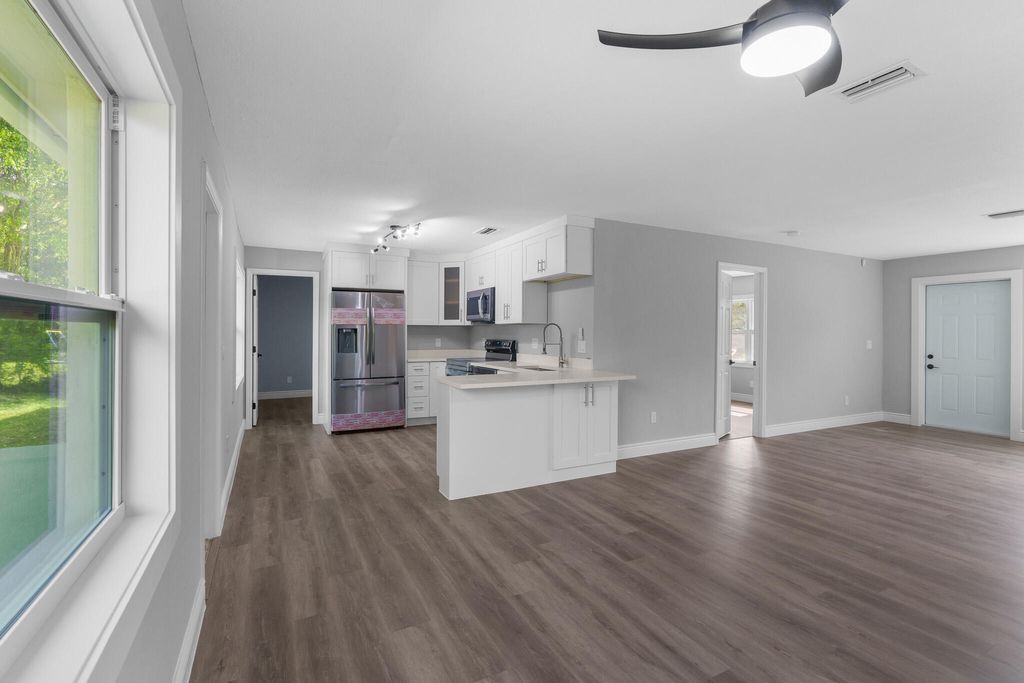 Photo of 1632 SE Pleasantview Street, Port Saint Lucie, FL 34983 (MLS # R10985057)