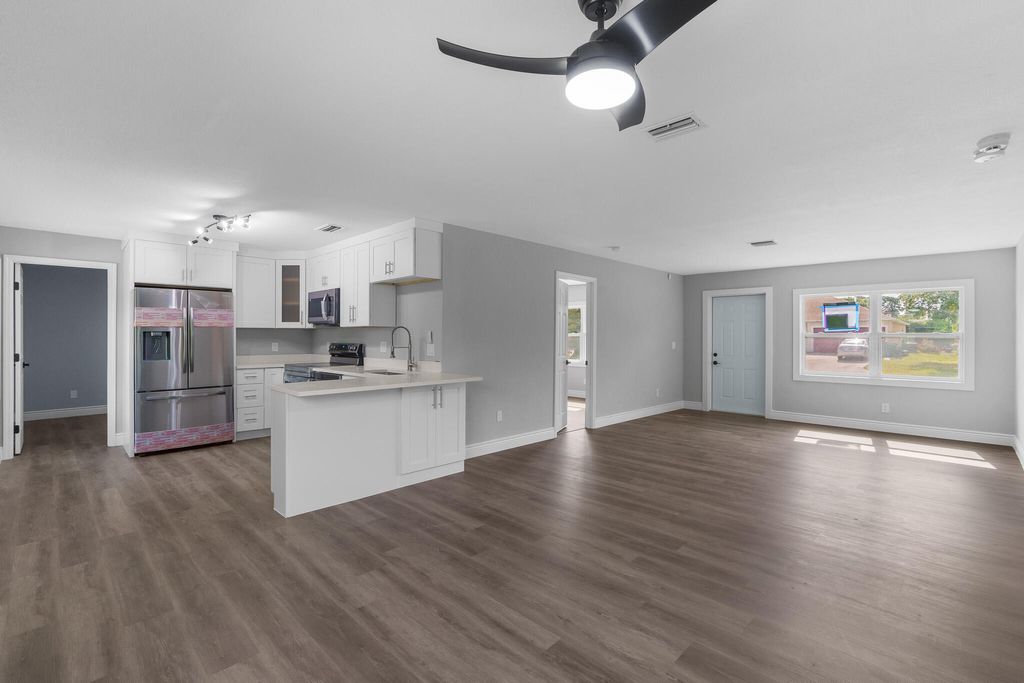 Photo of 1632 SE Pleasantview Street, Port Saint Lucie, FL 34983 (MLS # R10985057)