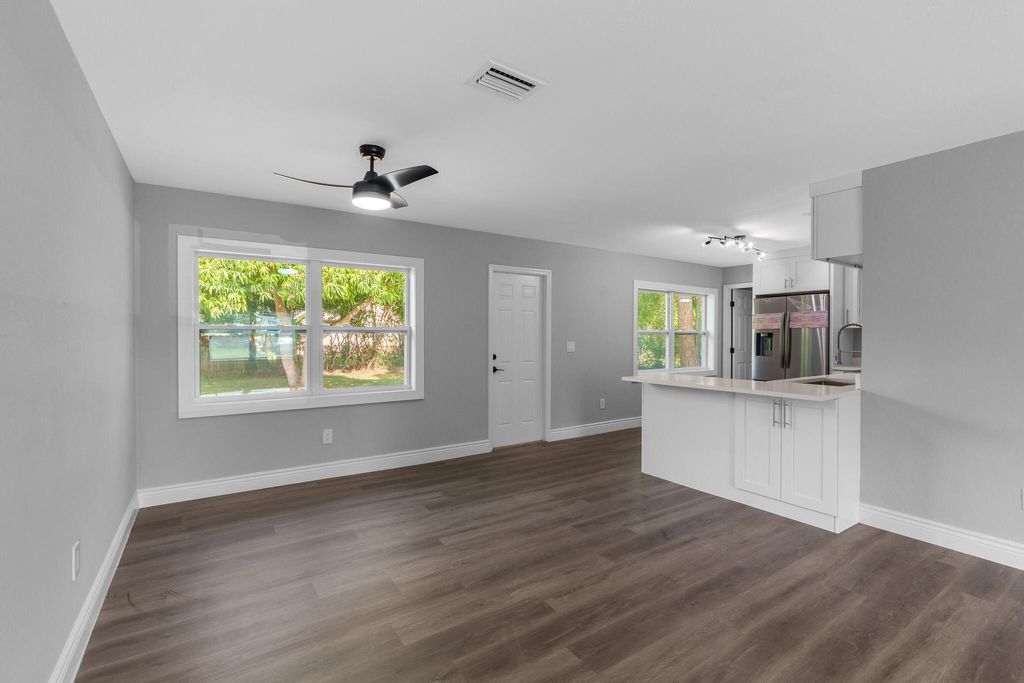 Photo of 1632 SE Pleasantview Street, Port Saint Lucie, FL 34983 (MLS # R10985057)