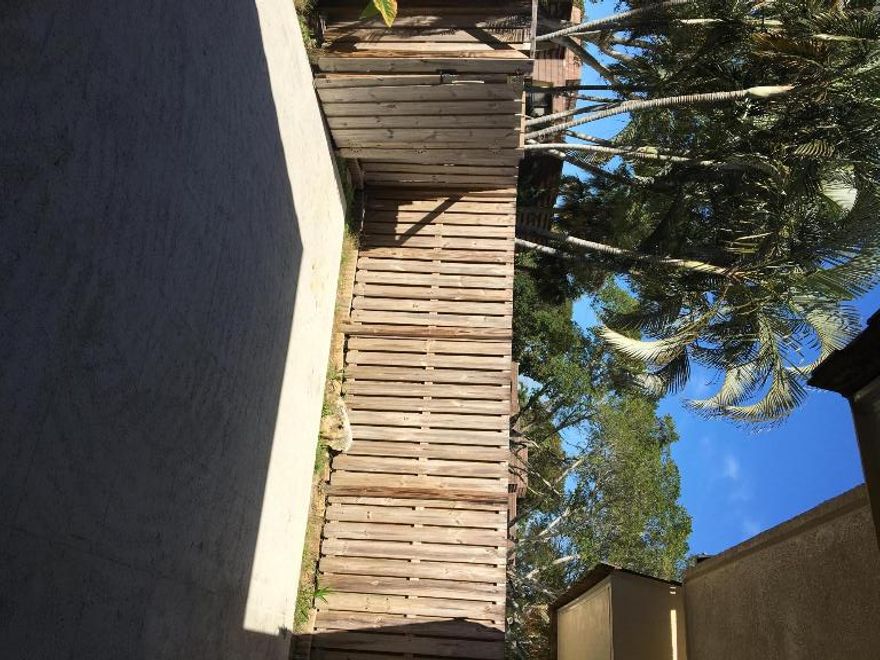 Townhouse features downstairs living area with 1/2 bath for guest and bedrooms upstairs.  Fireplace and fish tank in the wall are just some of the features that make this unit special. Master bedroom has large walk in closet.  Both bedrooms have their own balcony.  Large fenced in patio area for privacy.   Located in Palm Beach Gardens close to Gardens Mall, PBG Medical center and downtown.