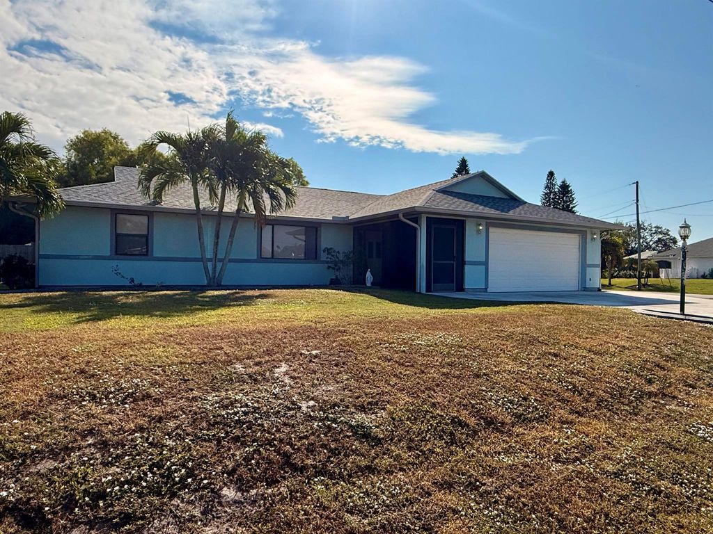 Photo of 455 SE Cork Road, Port Saint Lucie, FL 34984 (MLS # R11143288)