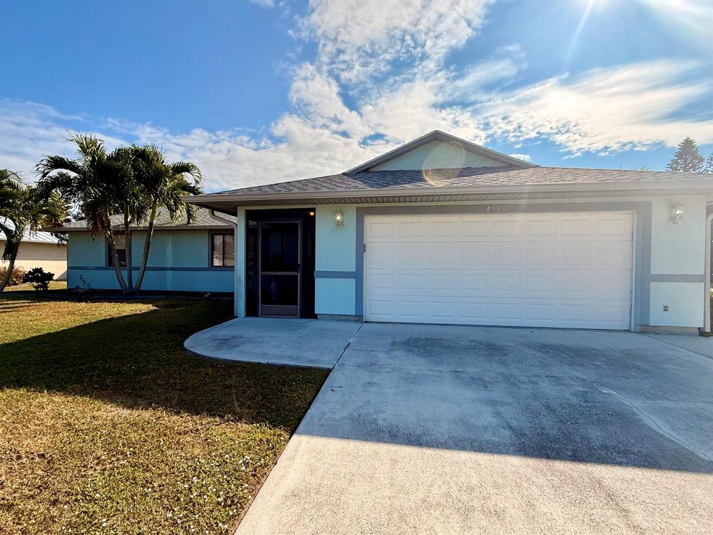 Photo of 455 SE Cork Road, Port Saint Lucie, FL 34984 (MLS # R11143288)
