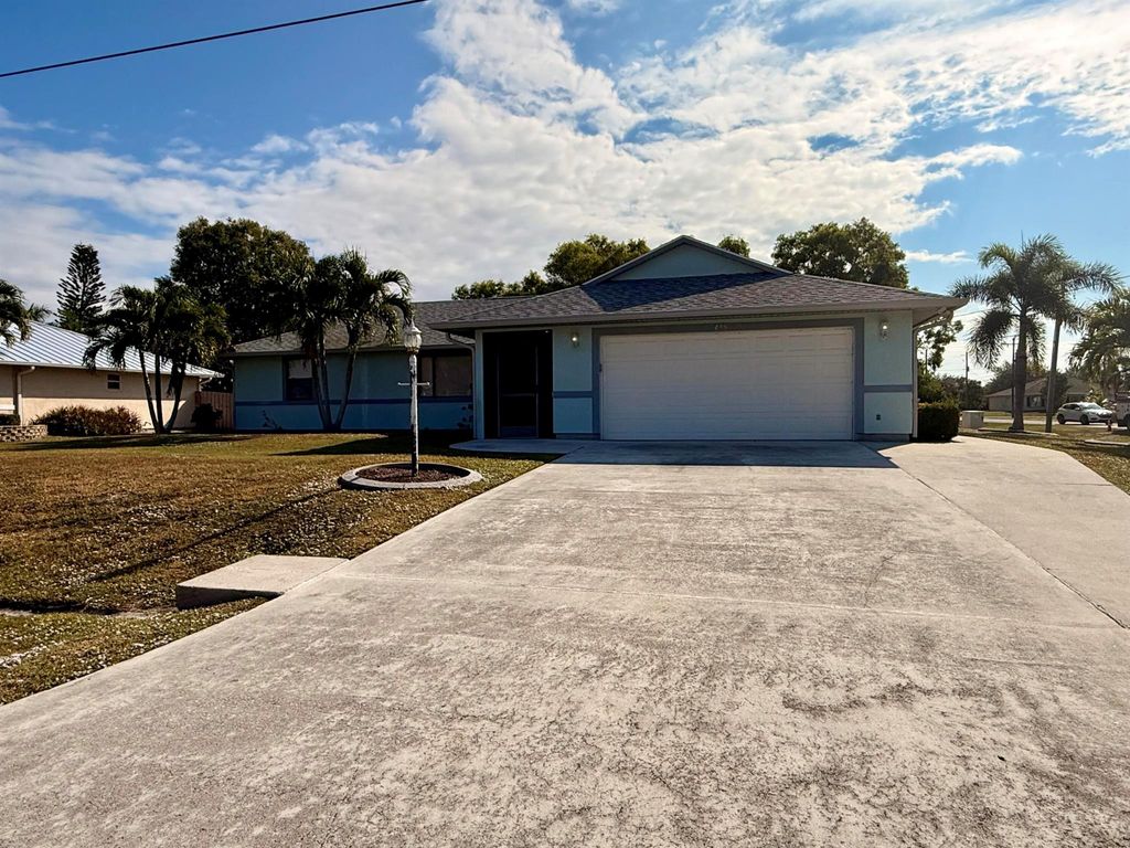 Photo of 455 SE Cork Road, Port Saint Lucie, FL 34984 (MLS # R11143288)